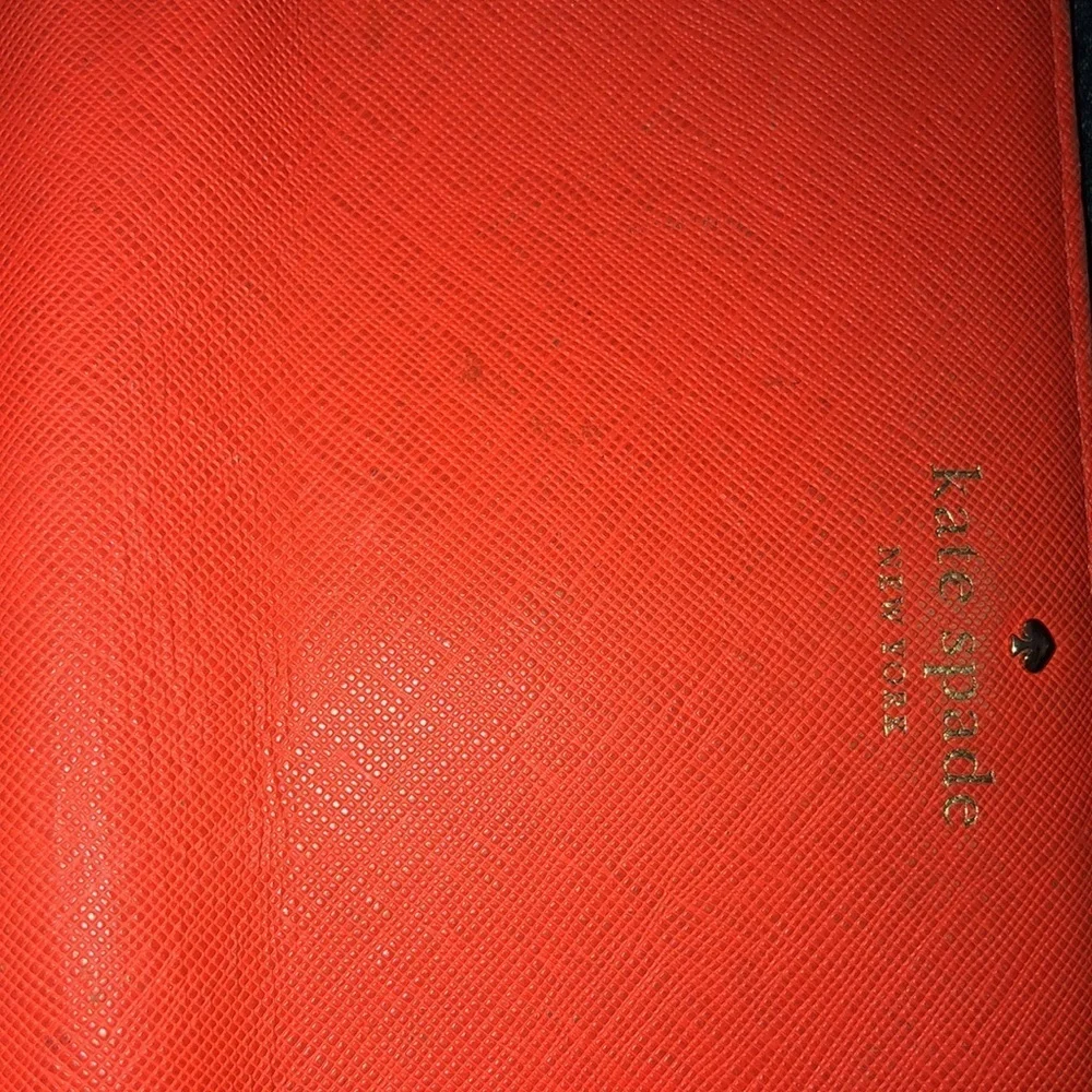 Kate Spade orange wristlet mobile case wallet genuine leather lots of slots